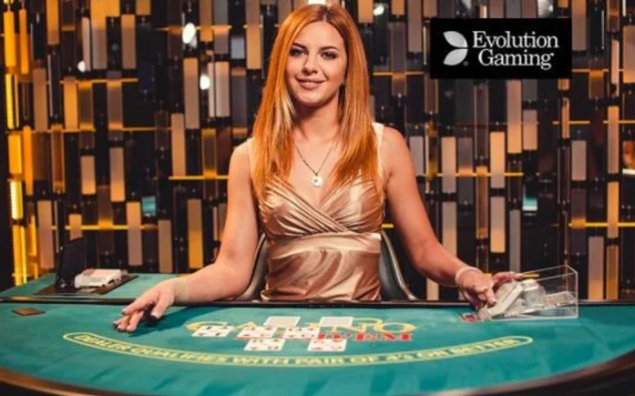 woman dealer in front of poker table