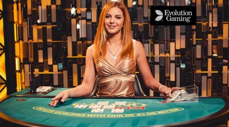 woman dealer in front of poker table