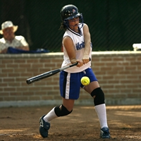 baseball player hitting a ball